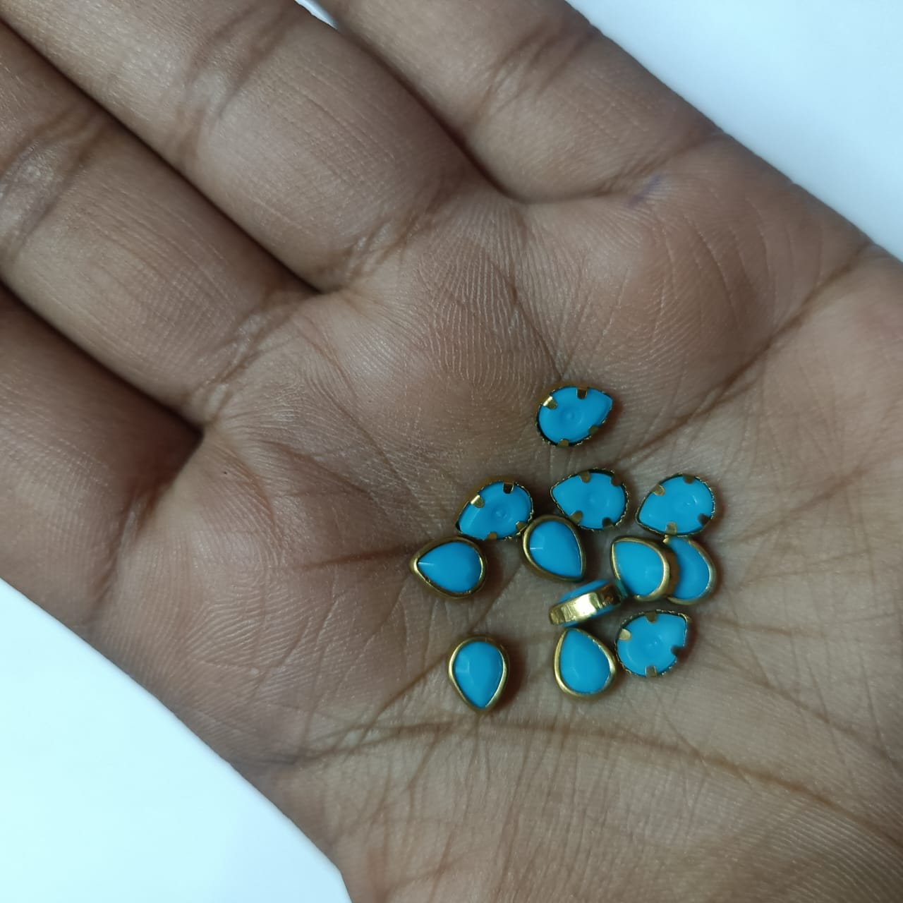 20g Pack of Tilak Shape Stones for Aari Embroidery and Jewelry Making – Available in Red, Green, Pink, Yellow, Purple, Blue, and More