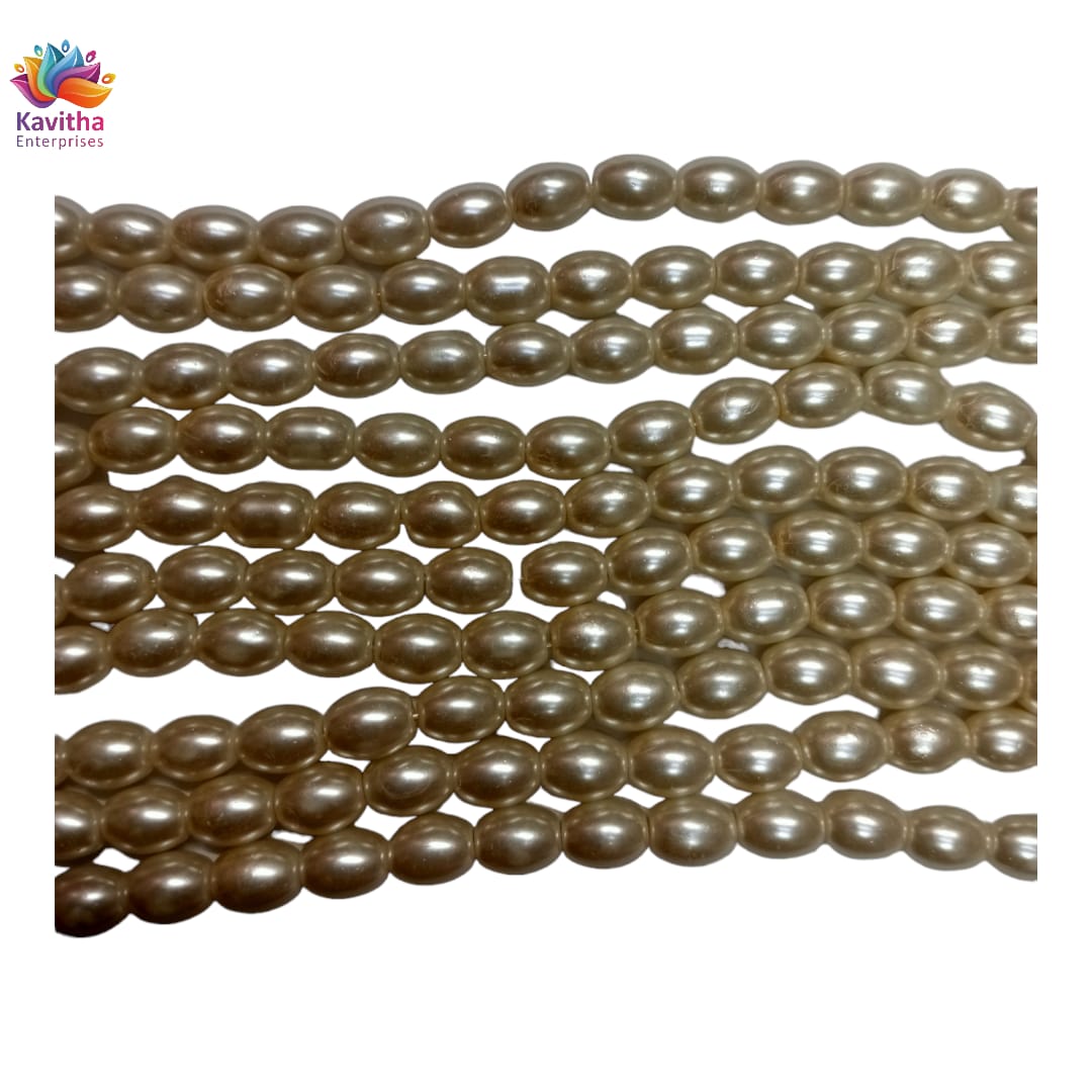 Oval beads ,cream colour for jewllary making , embroidery , ( pack of 1 string ) aprrox 90 beads