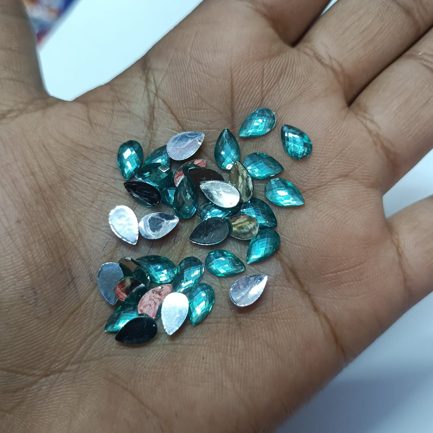 ## Kundan Stones for Aari Work/Embroidery and Jewellery Making - Teardrop Shape (5x8mm) - 50g - Assorted Colors (Red, Green, Pink, Gold, Maroon, Purple, Multi-Color, etc.) - 12 Colors