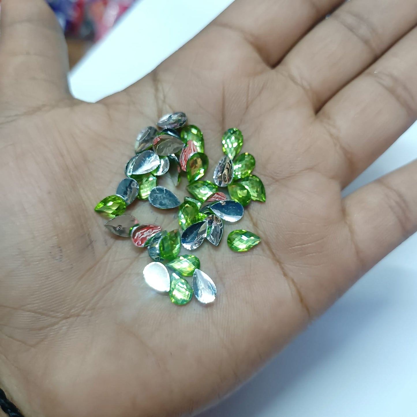 ## Kundan Stones for Aari Work/Embroidery and Jewellery Making - Teardrop Shape (5x8mm) - 50g - Assorted Colors (Red, Green, Pink, Gold, Maroon, Purple, Multi-Color, etc.) - 12 Colors