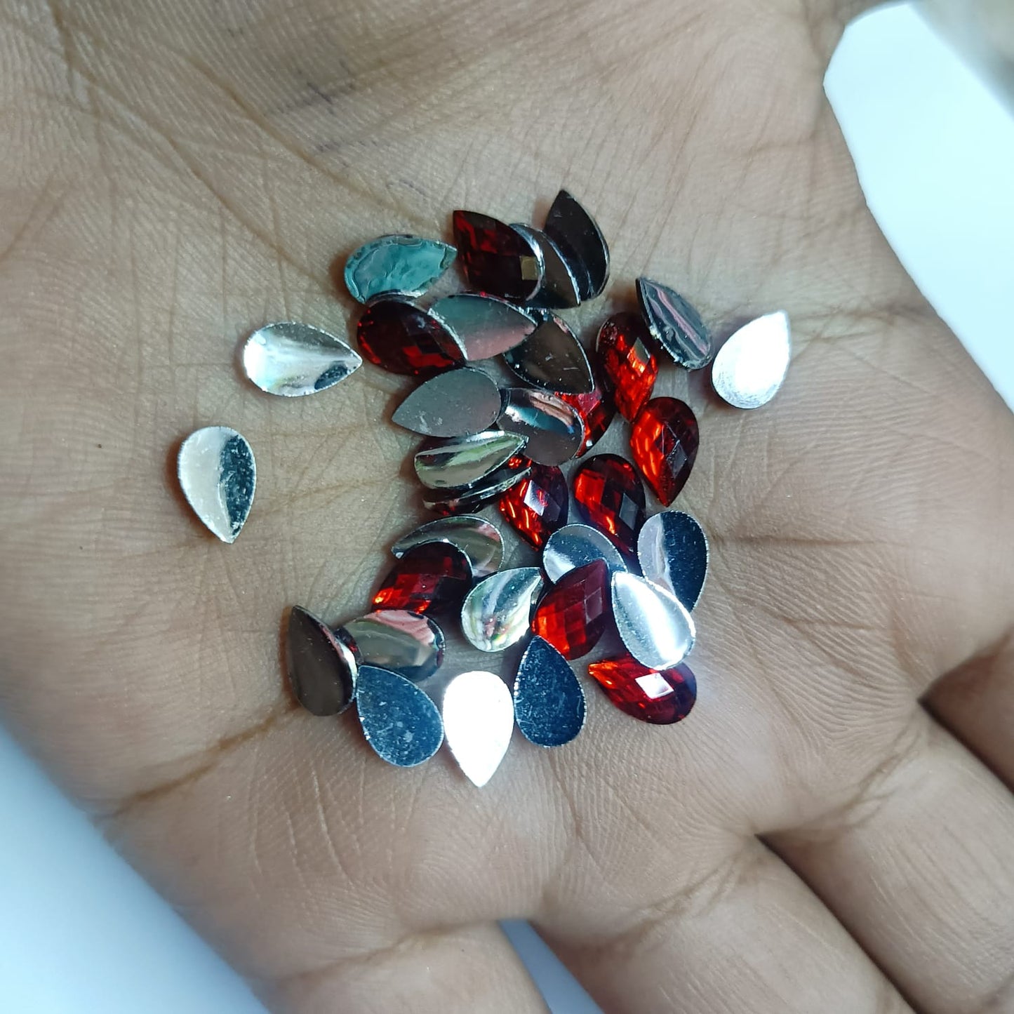 ## Kundan Stones for Aari Work/Embroidery and Jewellery Making - Teardrop Shape (5x8mm) - 50g - Assorted Colors (Red, Green, Pink, Gold, Maroon, Purple, Multi-Color, etc.) - 12 Colors