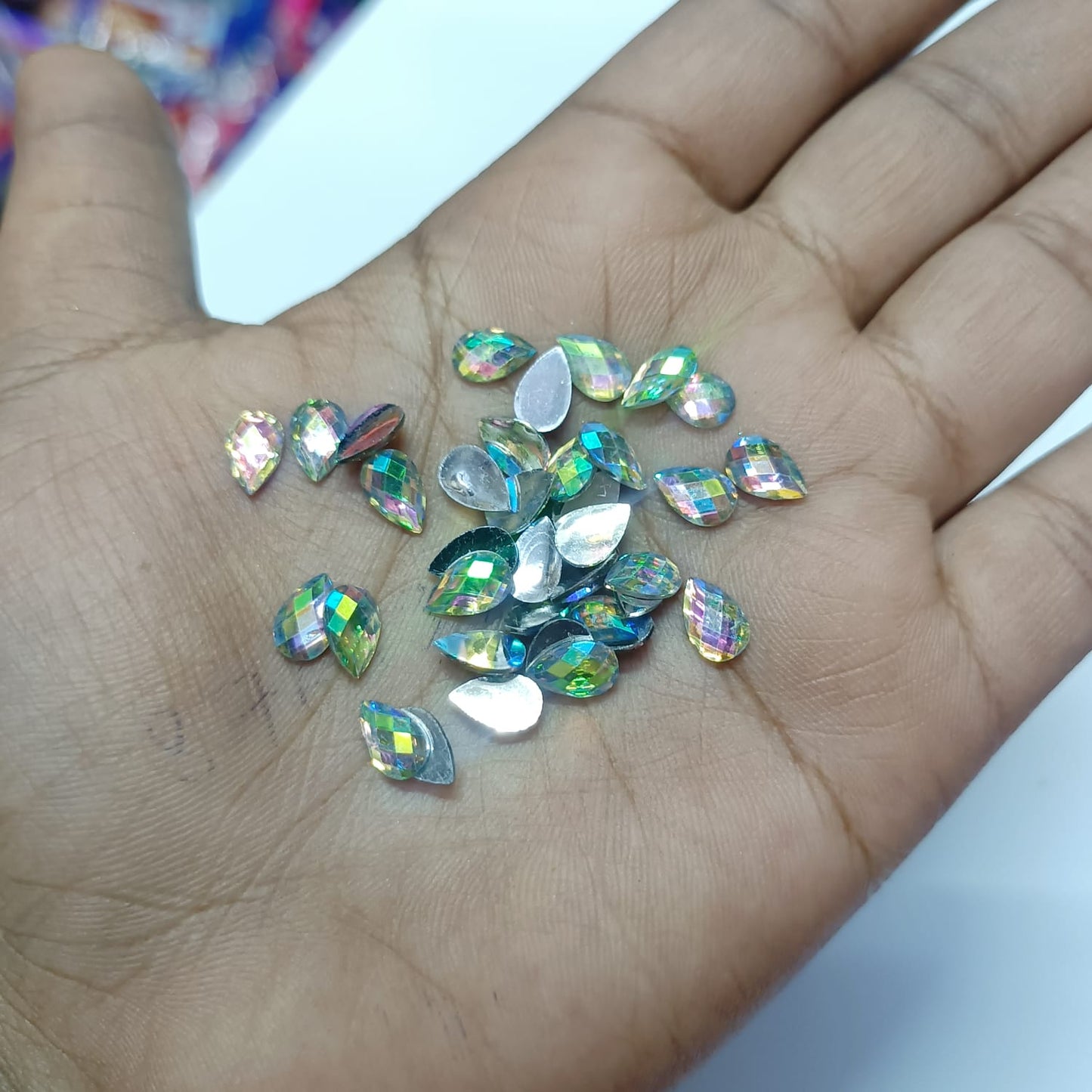 ## Kundan Stones for Aari Work/Embroidery and Jewellery Making - Teardrop Shape (5x8mm) - 50g - Assorted Colors (Red, Green, Pink, Gold, Maroon, Purple, Multi-Color, etc.) - 12 Colors