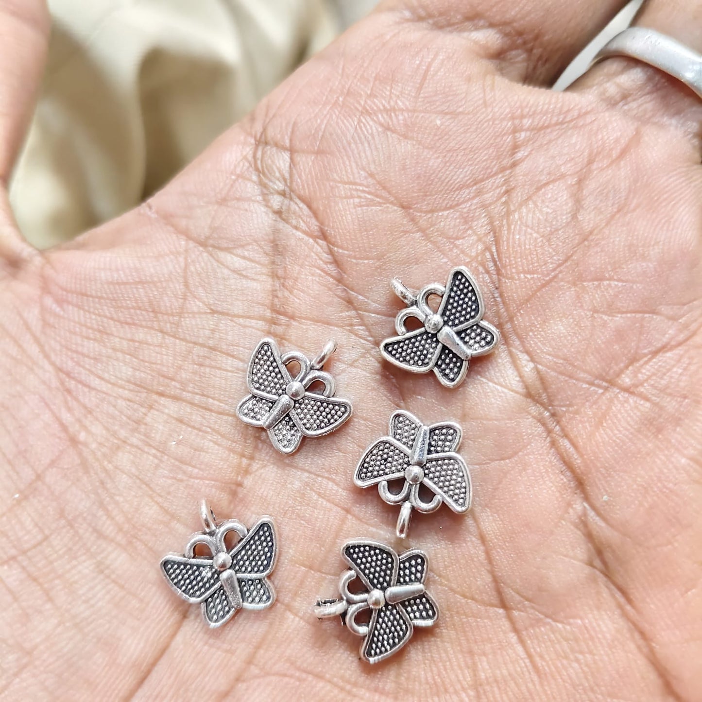 Antique Metal silver Beads butterfly shape, For Jewelry ,Bracelet ,Necklace , Saree Tassels Making Sold By 40 Gram (Approx 56 Beads )