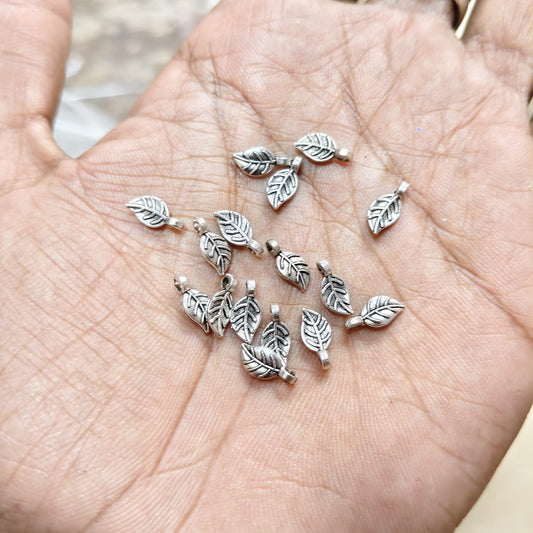 Antique Metal sliver Beads leaf shape, For Jewelry ,Bracelet ,Necklace , Saree Tassels Making Sold By 40 Gram (Approx 160 Beads )
