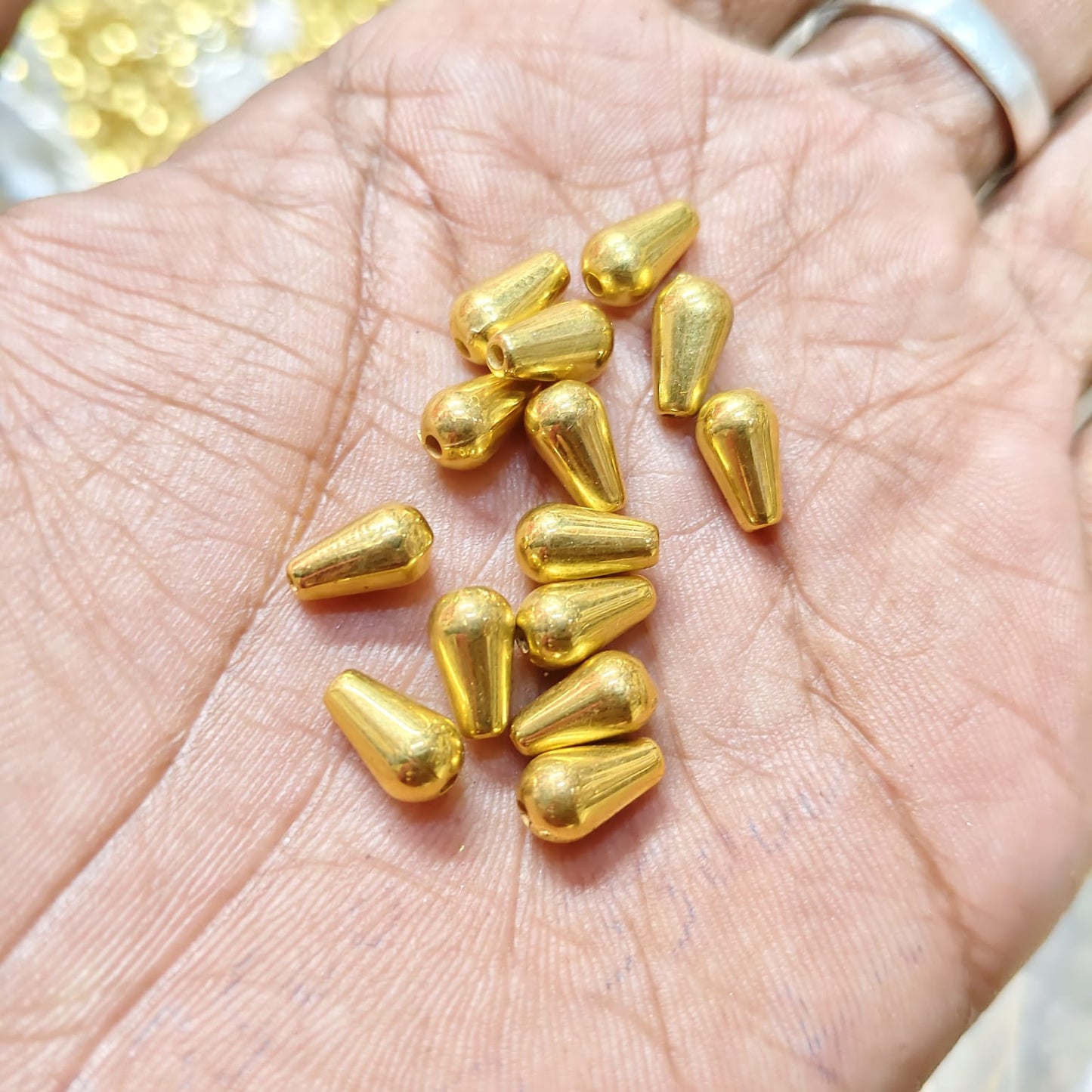 Bright Gold Drop Shape CCB Beads for Saree Tassels, Jewelry Making & Embroidery – Lightweight Plastic Designer Beads (50g Pack) | Kavitha Enterprises
